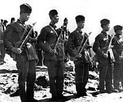 Bewaffnete chinesische Soldaten nahe der tibetisch-indischen Grenze, April 1959, picture-alliance / dpa